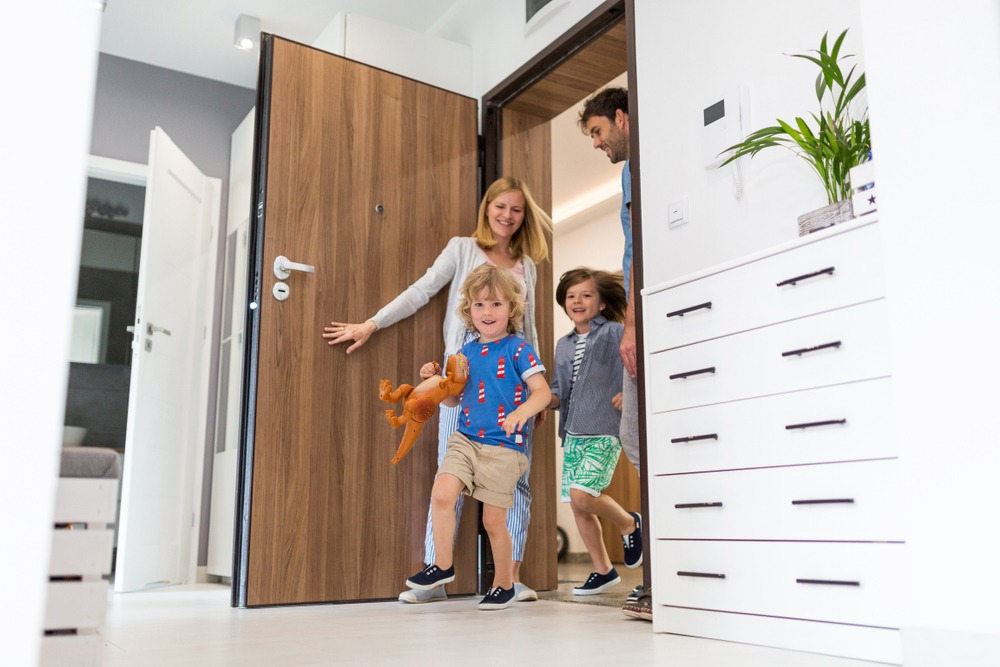 Family Entering House